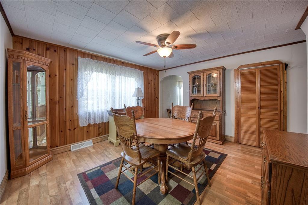 51 Sycamore Street Muse, PA 15350 - Photo 11 of 38 a view of a dining room with furniture window and wooden floor
