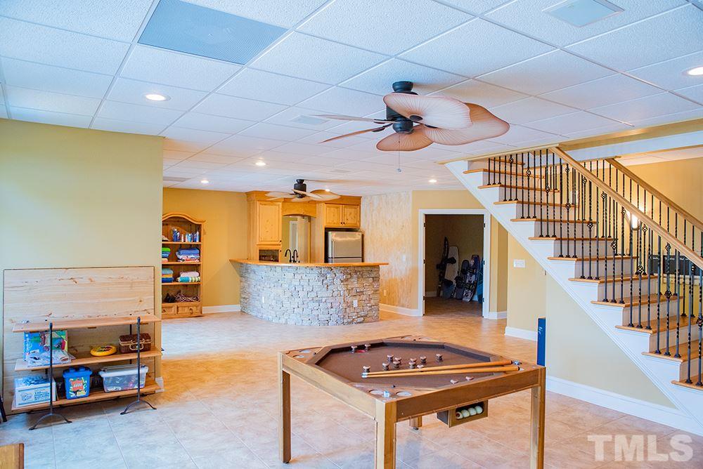 159 Duck Pointe Drive Roxboro, NC 27574 - Photo 20 of 30 a living room with furniture and a flat screen tv