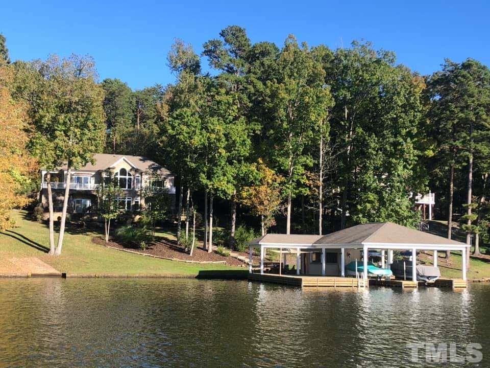 159 Duck Pointe Drive Roxboro, NC 27574 - Photo 30 of 30 a view of a lake with house