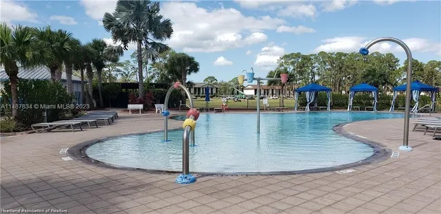 a view of a swimming pool with a fountain