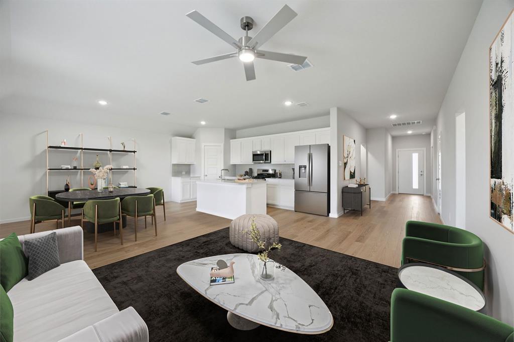 1153 Del Rio Drive Lavon, TX 75166 - Photo 26 of 27 a living room with furniture and kitchen view