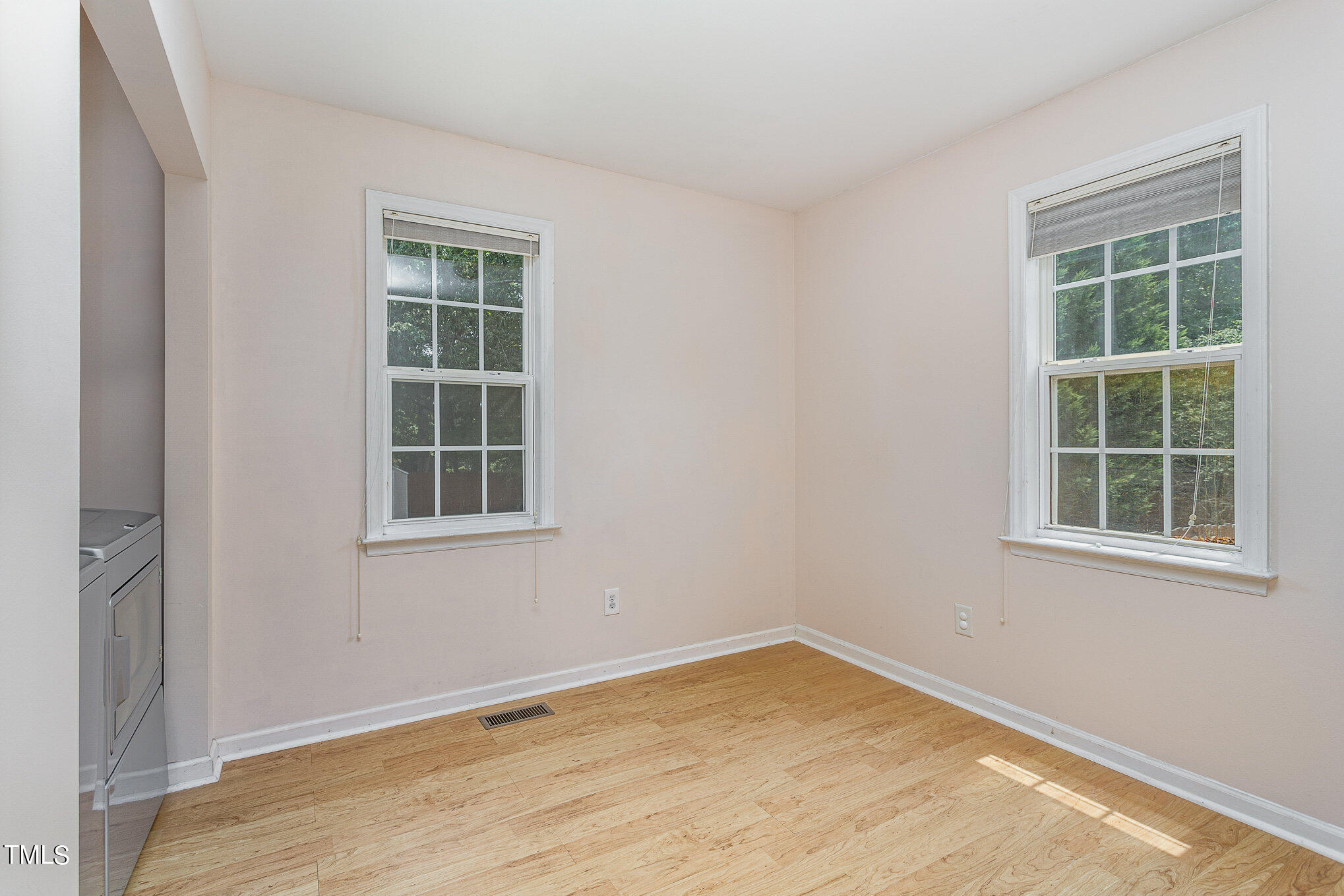 6309 Bridgemont Lane Willow Spring, NC 27592 - Photo 11 of 27 an empty room with a window