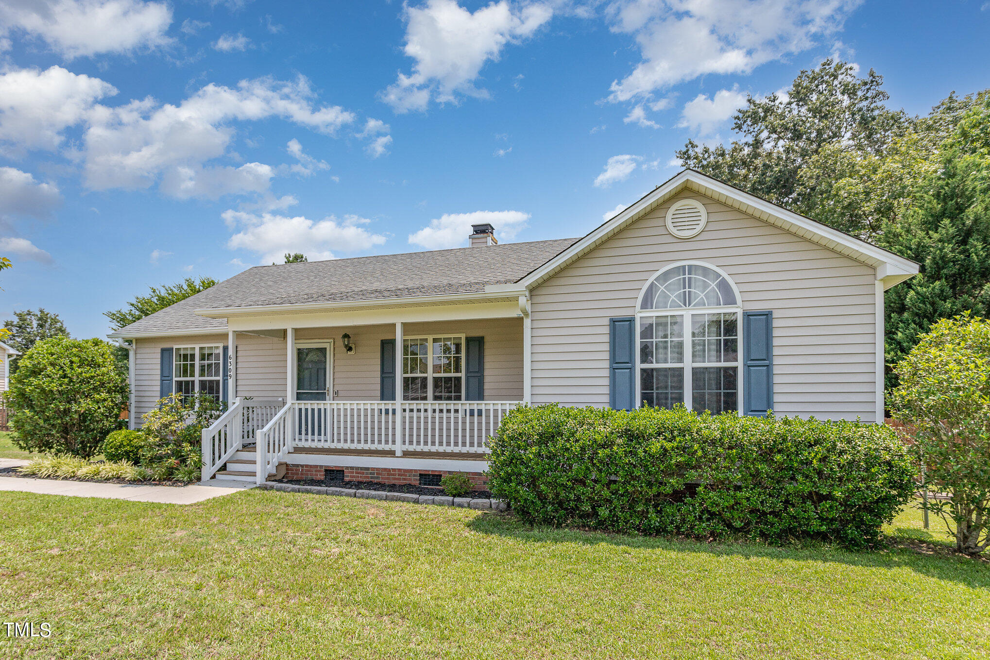 6309 Bridgemont Lane Willow Spring, NC 27592 - Photo 2 of 27 a front view of house with yard and green space