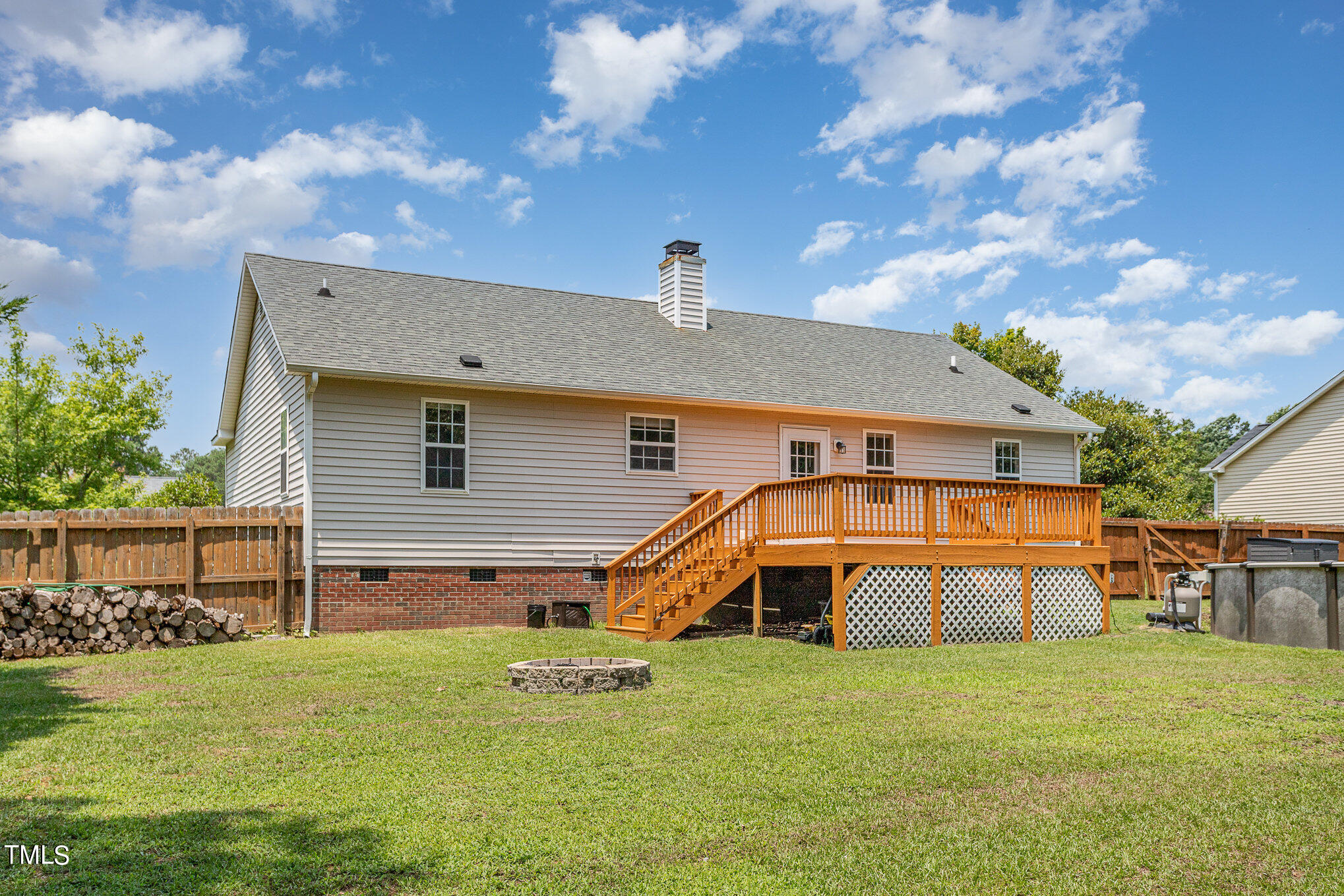 6309 Bridgemont Lane Willow Spring, NC 27592 - Photo 24 of 27 a view of a house with a backyard