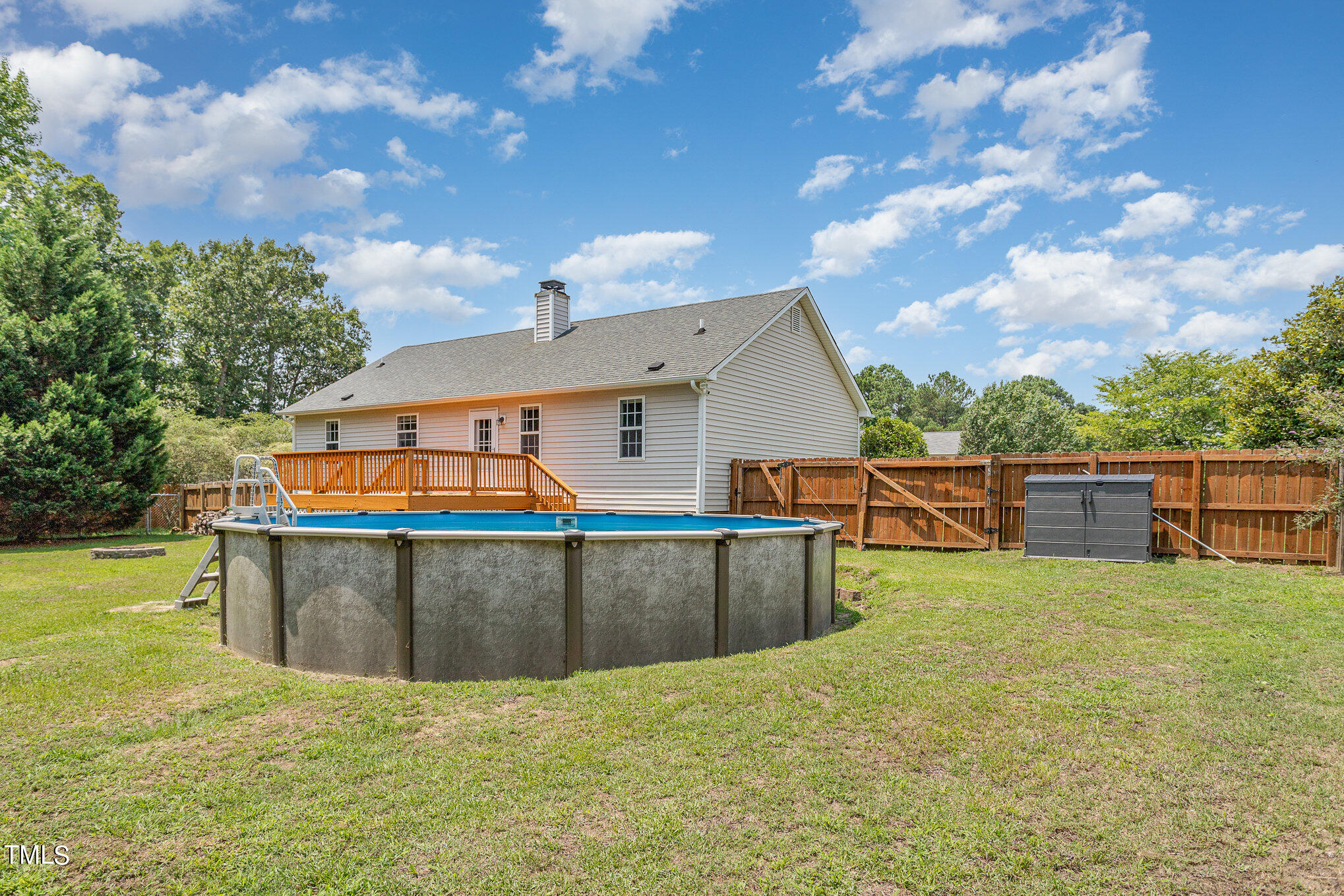 6309 Bridgemont Lane Willow Spring, NC 27592 - Photo 26 of 27 a view of a terrace with open kitchen