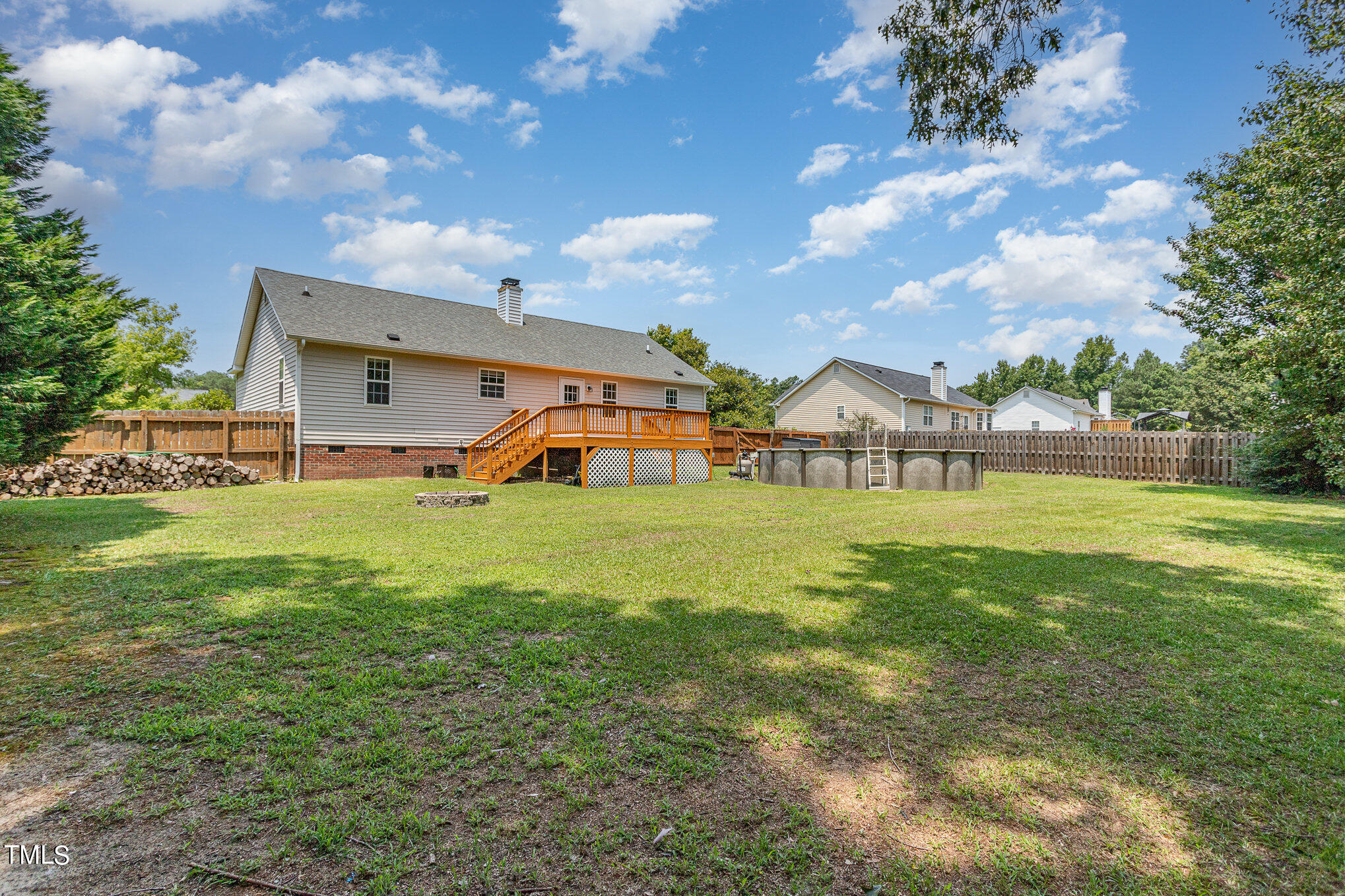 6309 Bridgemont Lane Willow Spring, NC 27592 - Photo 27 of 27 a view of a house with a big yard