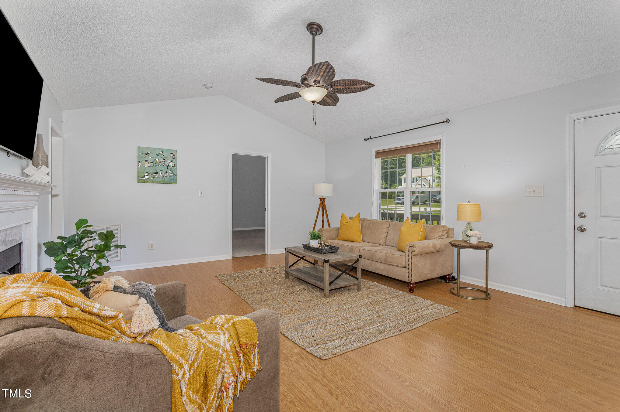 6309 Bridgemont Lane Willow Spring, NC 27592 - Photo 6 of 27 a bedroom with furniture and a window