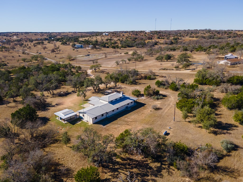 622 Paradise Ranch Road Fredericksburg, TX 78624 - Photo 12 of 90 an aerial view of residential houses with outdoor space