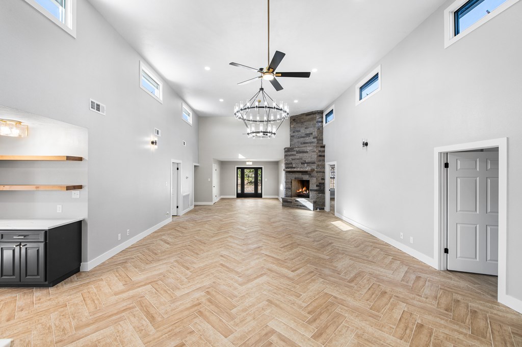 622 Paradise Ranch Road Fredericksburg, TX 78624 - Photo 19 of 90 a view of an empty room with a kitchen