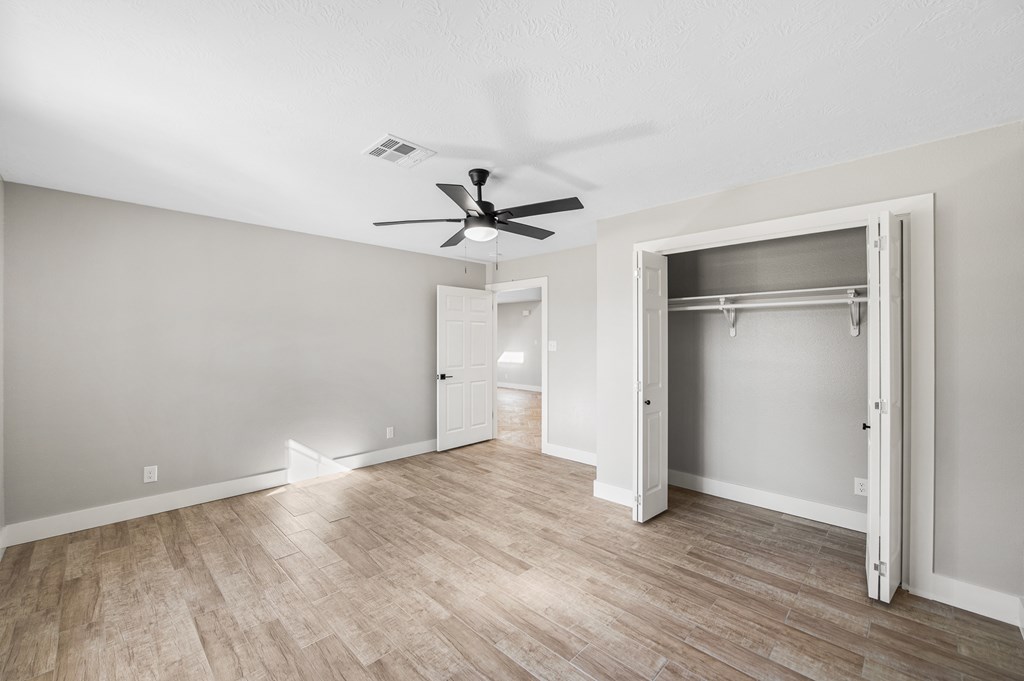 622 Paradise Ranch Road Fredericksburg, TX 78624 - Photo 50 of 90 a view of empty room with wooden floor