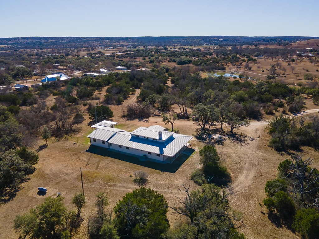 622 Paradise Ranch Road Fredericksburg, TX 78624 - Photo 78 of 90 an aerial view of a house with a yard