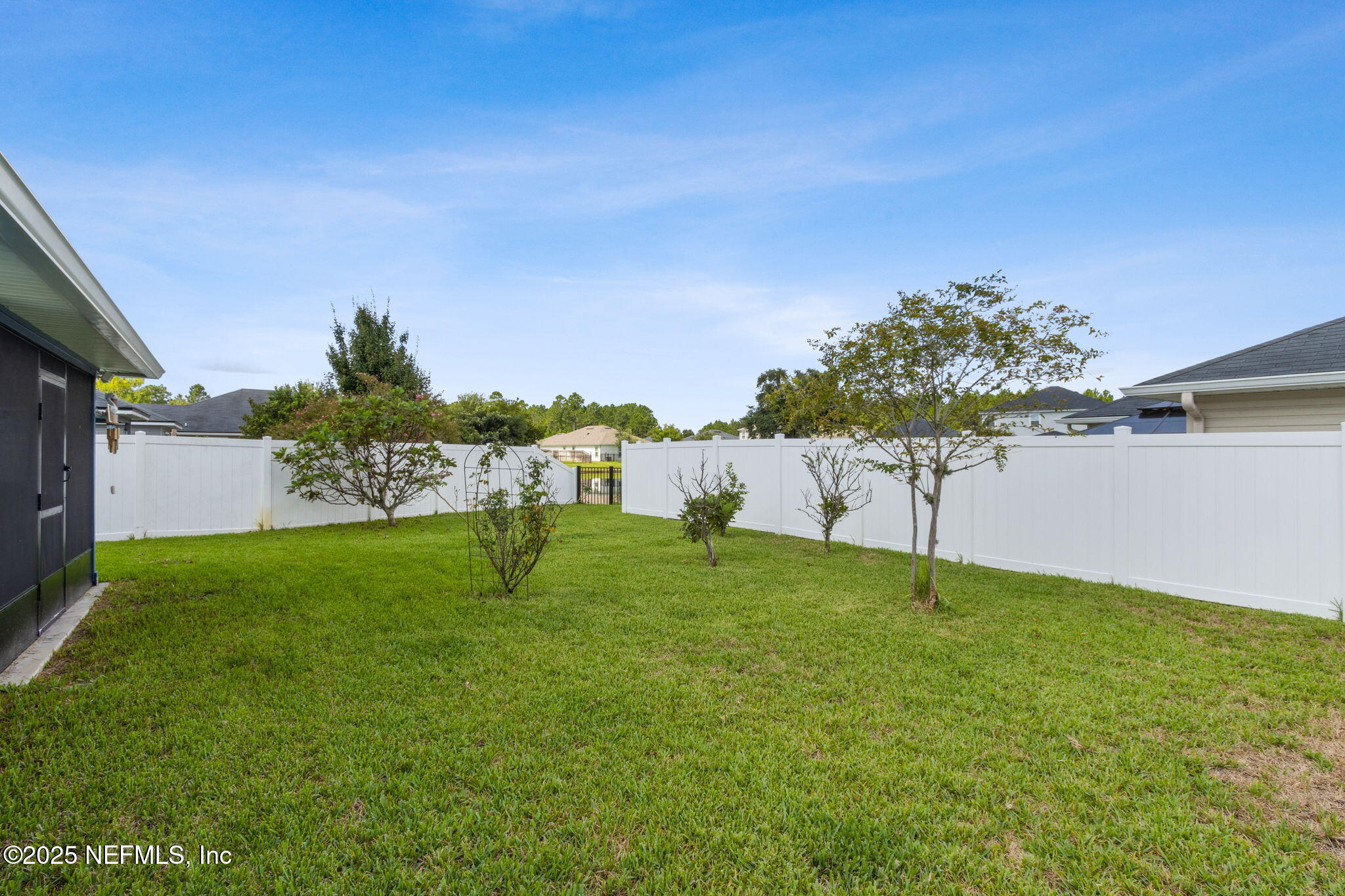 94055 Last Lane Yulee, FL 32097 - Photo 26 of 30 a view of an outdoor space and a yard