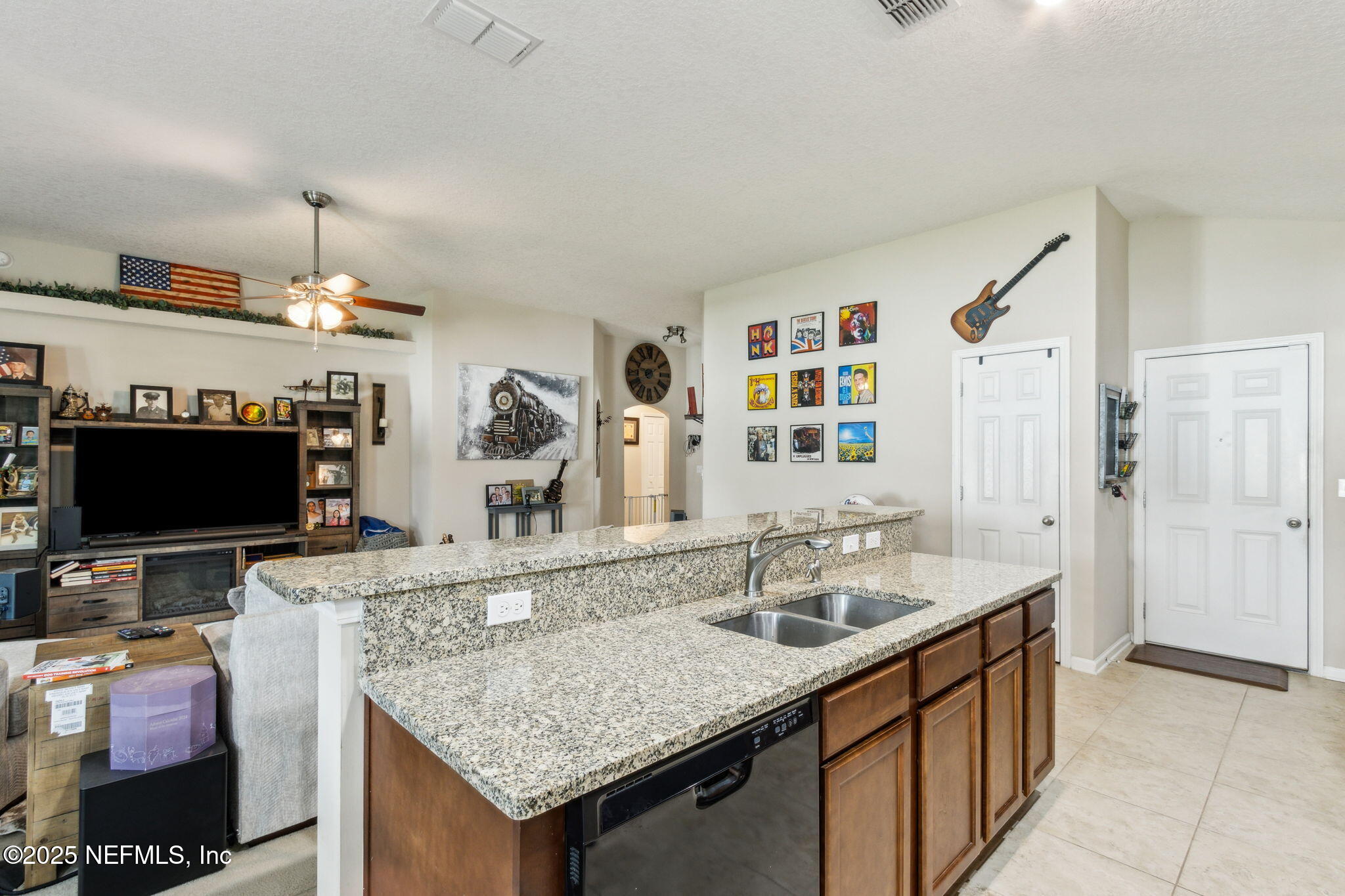 94055 Last Lane Yulee, FL 32097 - Photo 10 of 30 a kitchen with granite countertop a sink and a stove