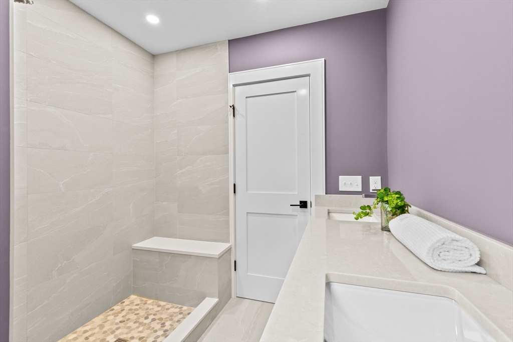 90 Addington Road, Unit 1 Brookline, MA 02445 - Photo 17 of 21 a bathroom with a sink and toilet