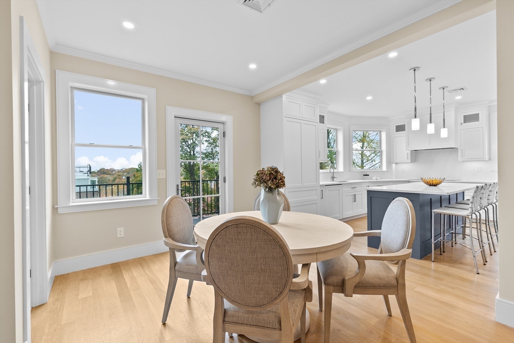 90 Addington Road, Unit 1 Brookline, MA 02445 - Photo 5 of 21 a dining room with furniture and window