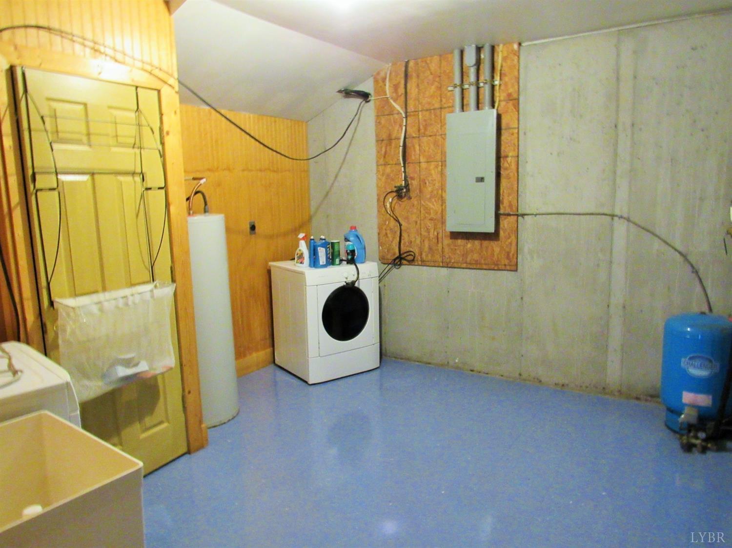 1695 Stapleton Road Madison Heights, VA 24572 - Photo 24 of 25 a view of a bathroom with a sink and wooden floor