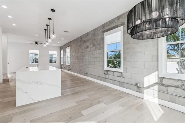 a view of balcony with wooden floor