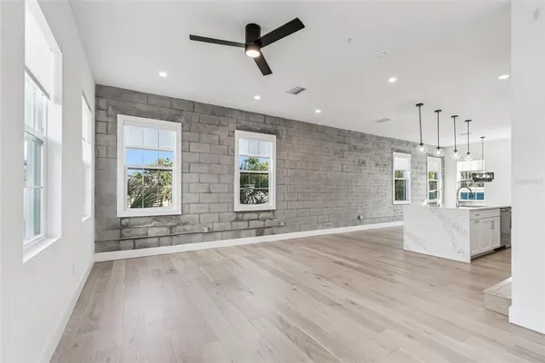 a view of staircase with white walls
