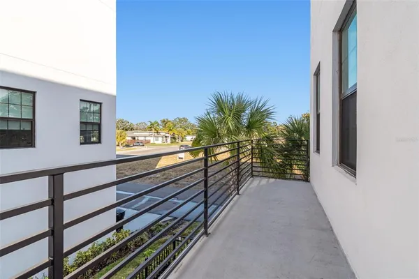 a view of a hallway with washer and dryer