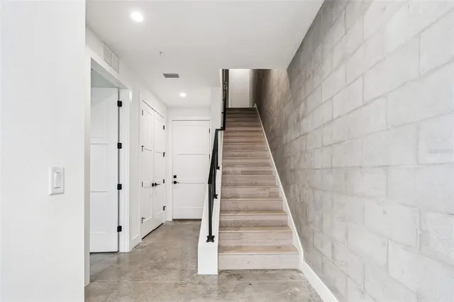 a view of a hallway with white walls