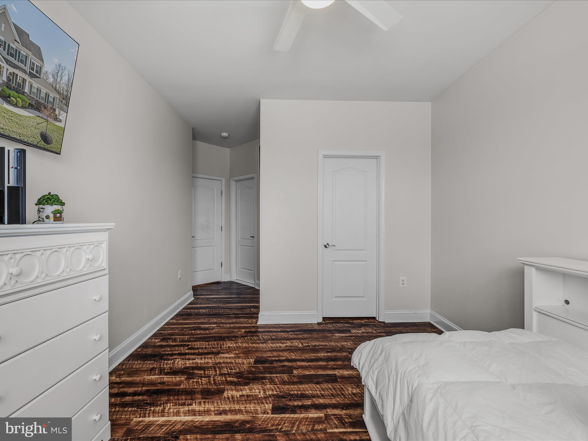 258 Tributary Trail Falling Waters, WV 25419 - Photo 33 of 89 a bedroom with a bed and a window