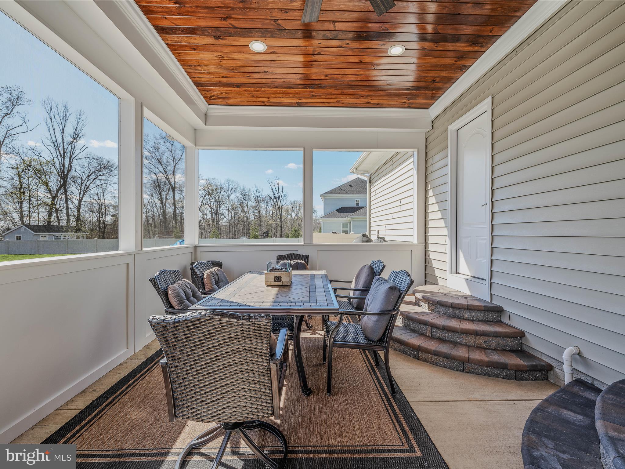 258 Tributary Trail Falling Waters, WV 25419 - Photo 56 of 89 a view of a patio with a table and chairs