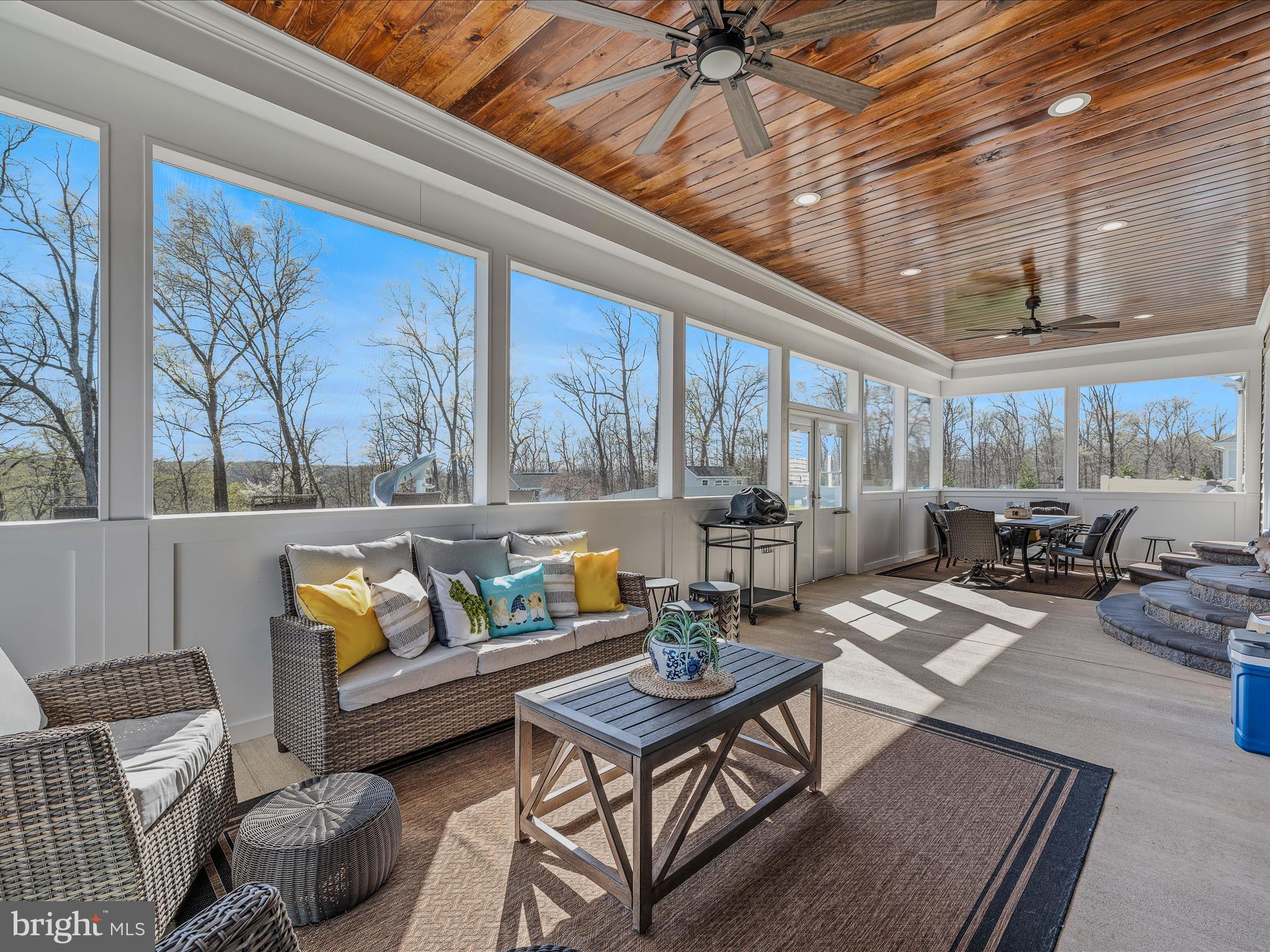 258 Tributary Trail Falling Waters, WV 25419 - Photo 58 of 89 a living room with furniture and a large window