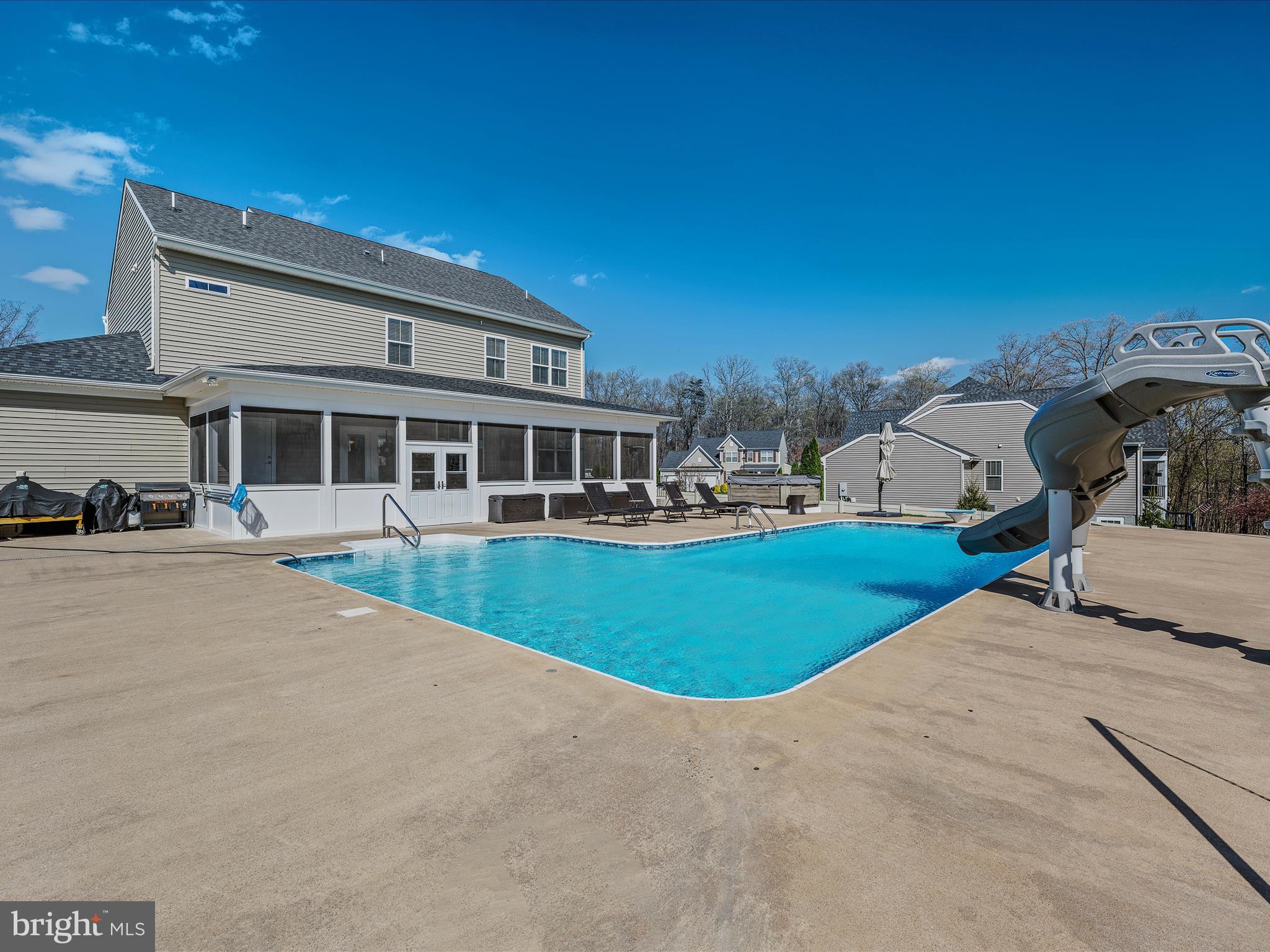 258 Tributary Trail Falling Waters, WV 25419 - Photo 59 of 89 a view of a house with a swimming pool