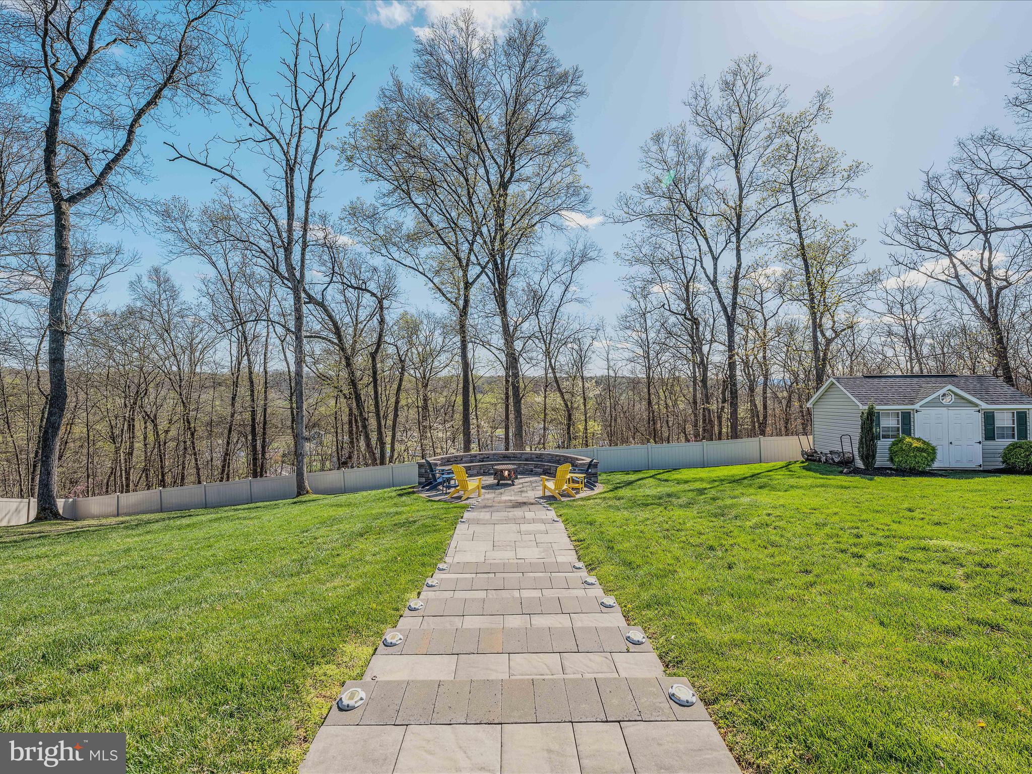 258 Tributary Trail Falling Waters, WV 25419 - Photo 65 of 89 a front view of a house with garden
