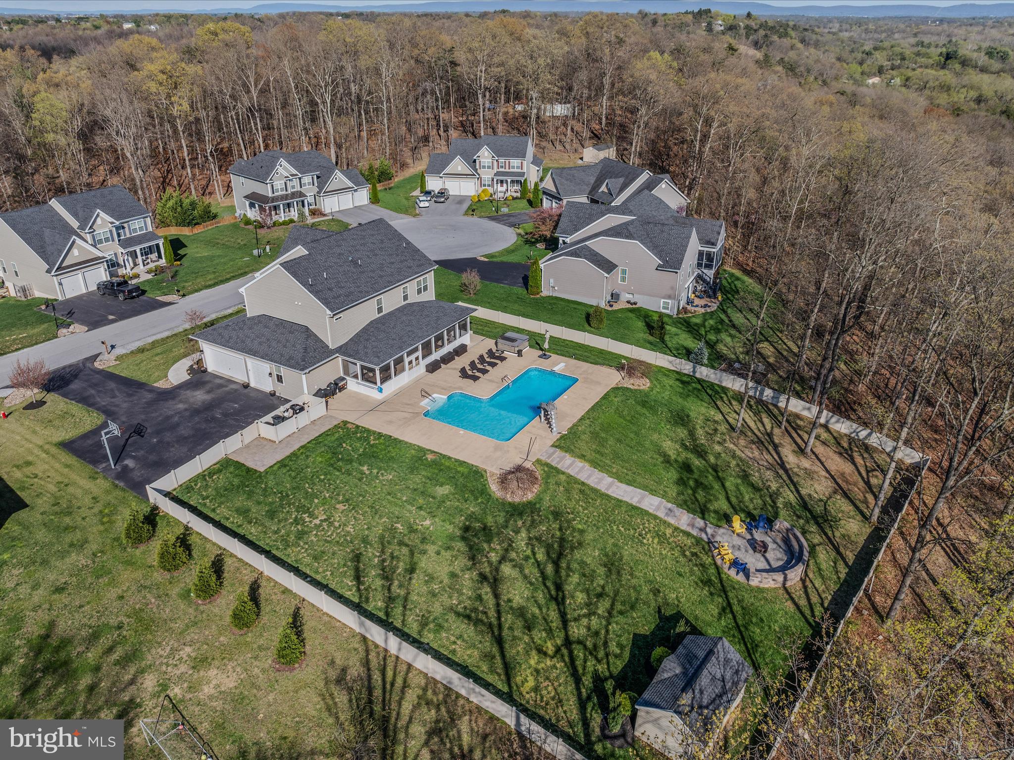 258 Tributary Trail Falling Waters, WV 25419 - Photo 85 of 89 an aerial view of a house with a garden and lake view