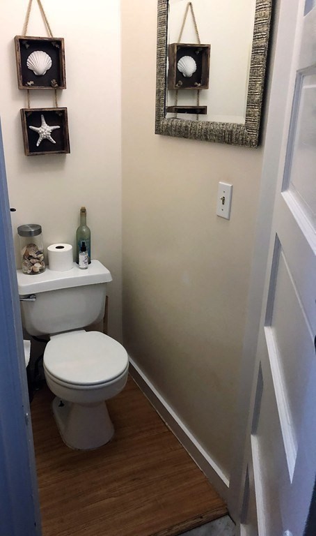 44 Sculpin Way, Unit 44 Swampscott, MA 01907 - Photo 13 of 21 a bathroom with a toilet a sink and a mirror