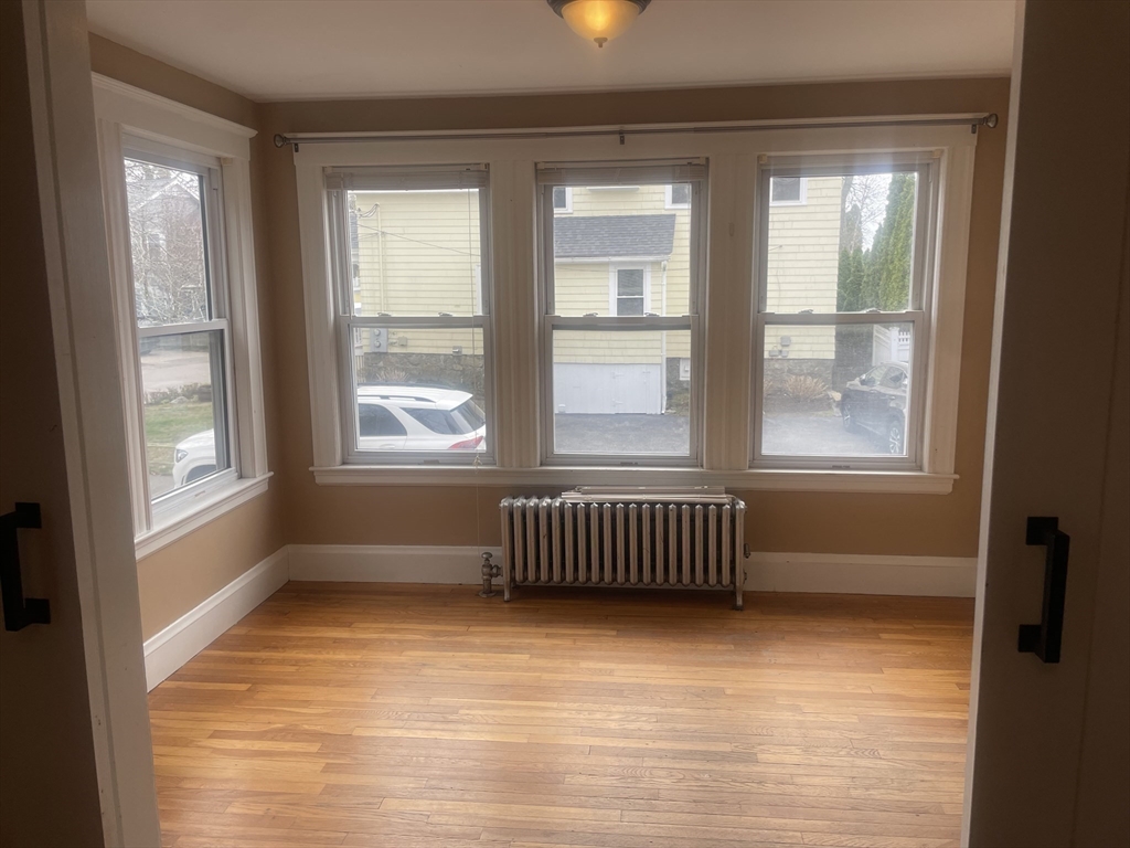 44 Sculpin Way, Unit 44 Swampscott, MA 01907 - Photo 4 of 21 a view of an empty room with a window