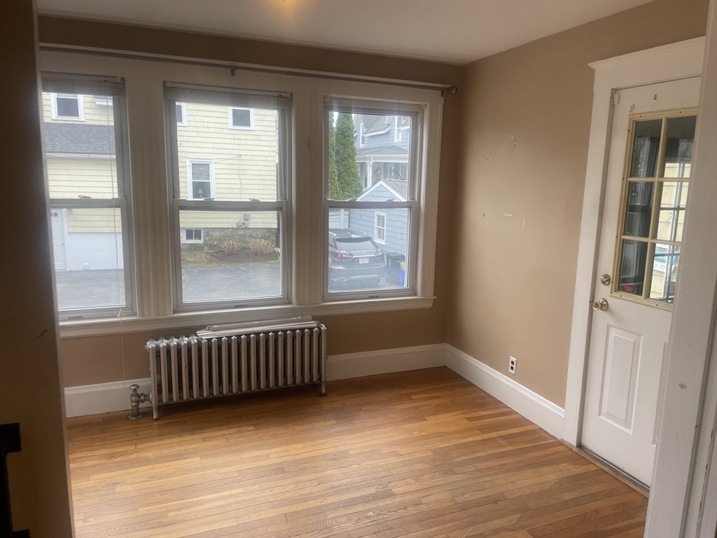 44 Sculpin Way, Unit 44 Swampscott, MA 01907 - Photo 5 of 21 a view of an empty room with a window