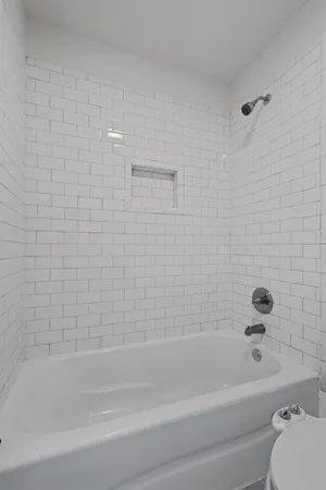 a bathroom with a bathtub
