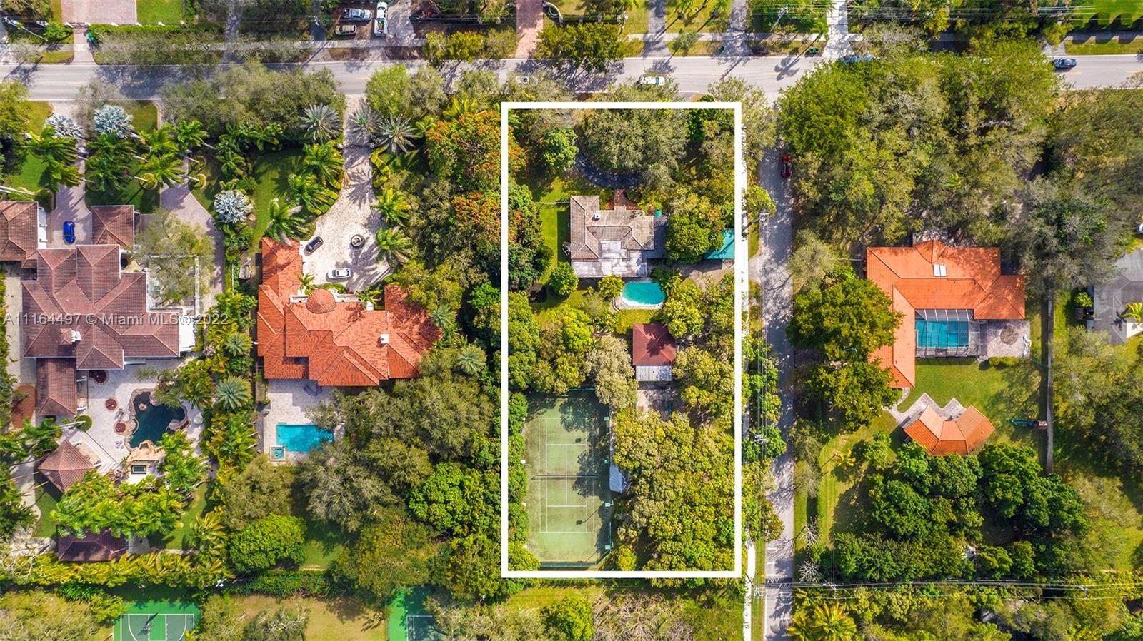 7335 Southwest 104th Street Pinecrest, FL 33156 - Photo 3 of 16 an aerial view of houses with yard