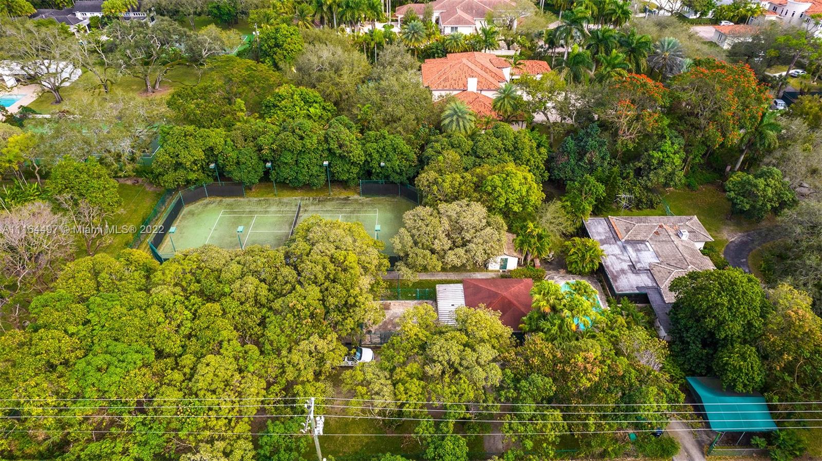 7335 Southwest 104th Street Pinecrest, FL 33156 - Photo 6 of 16 a view of a garden