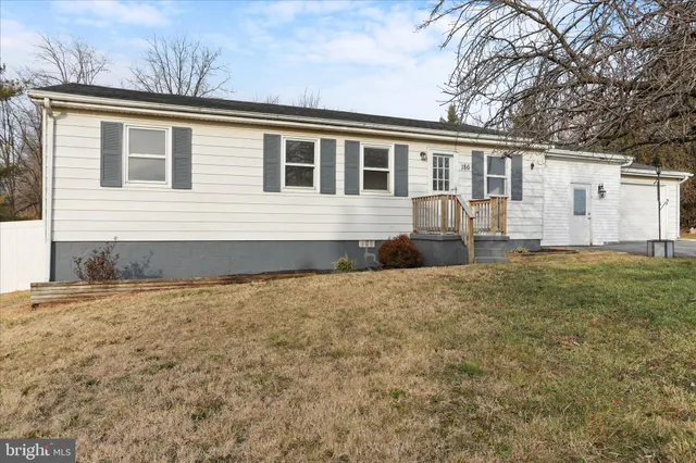 a house view with a garden space