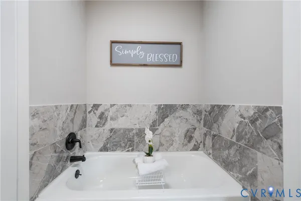 a bathroom with a bathtub