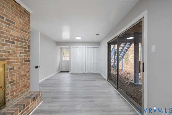 a view of an empty room and window
