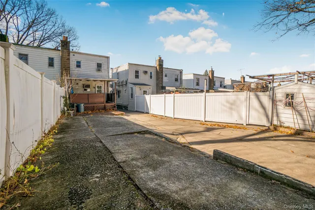 a view of a backyard of the house