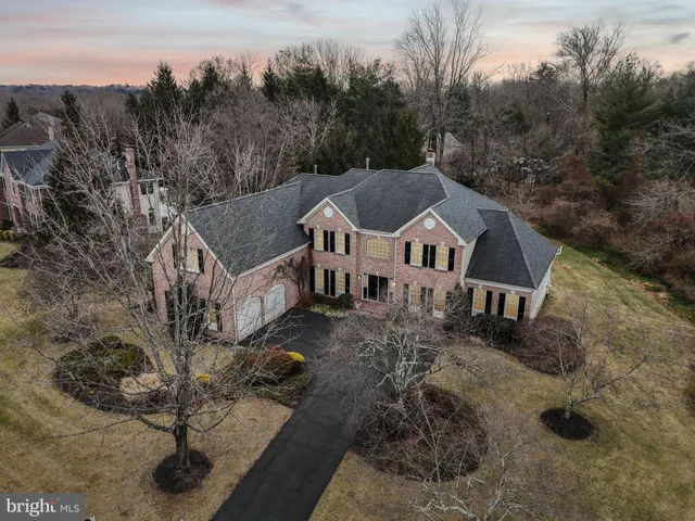 a view of entryway with wooden floor and stairs