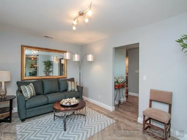 16544 Franzen Farm Road San Diego, CA 92127 - Photo 17 of 25 a living room with furniture and a large window