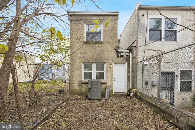 a view of a back yard of the house