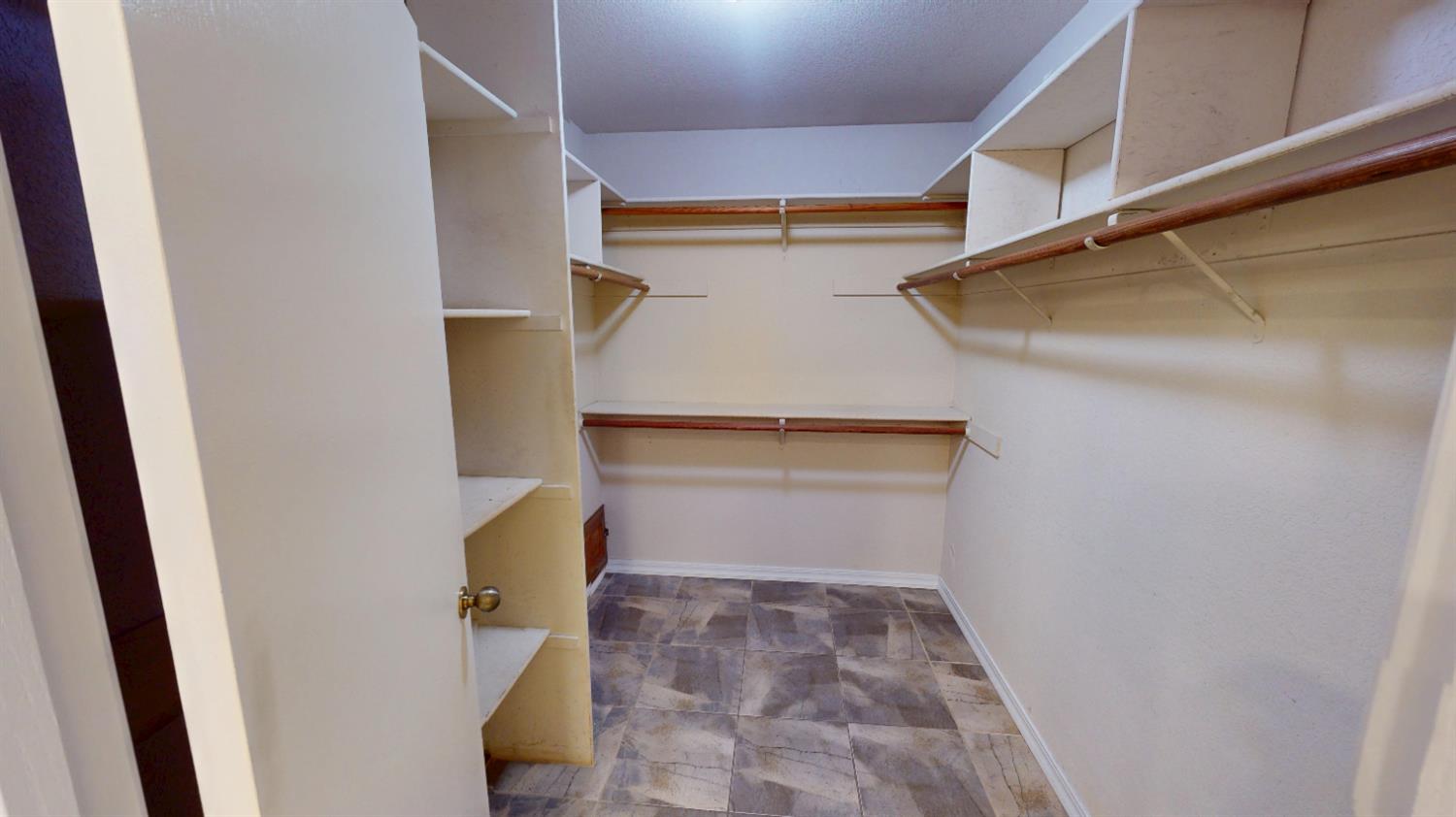 3379 Cambridge Road Cameron Park, CA 95682 - Photo 39 of 74 a view of walk in closet