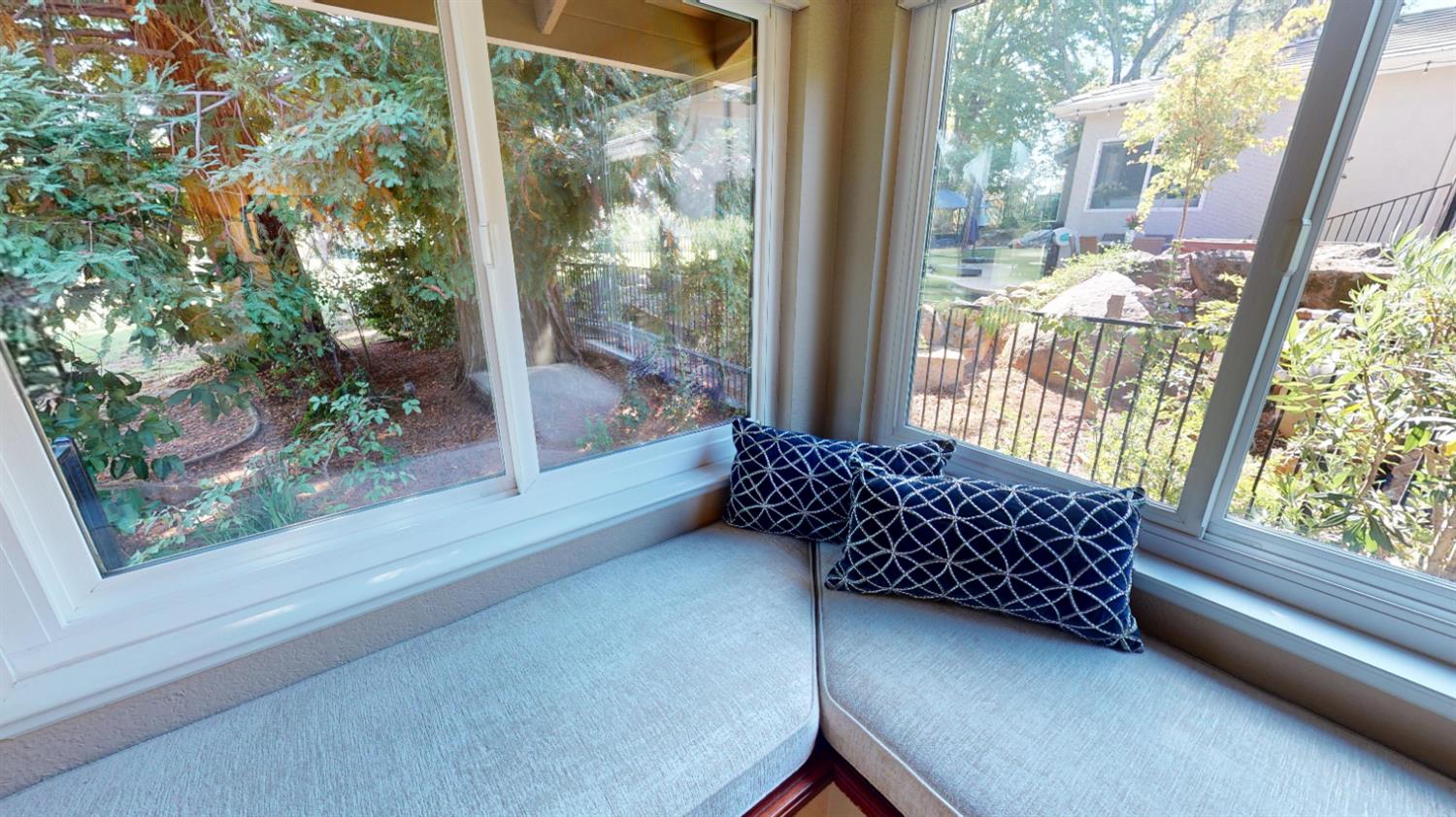 3379 Cambridge Road Cameron Park, CA 95682 - Photo 52 of 74 a bed sitting in a bedroom next to a window