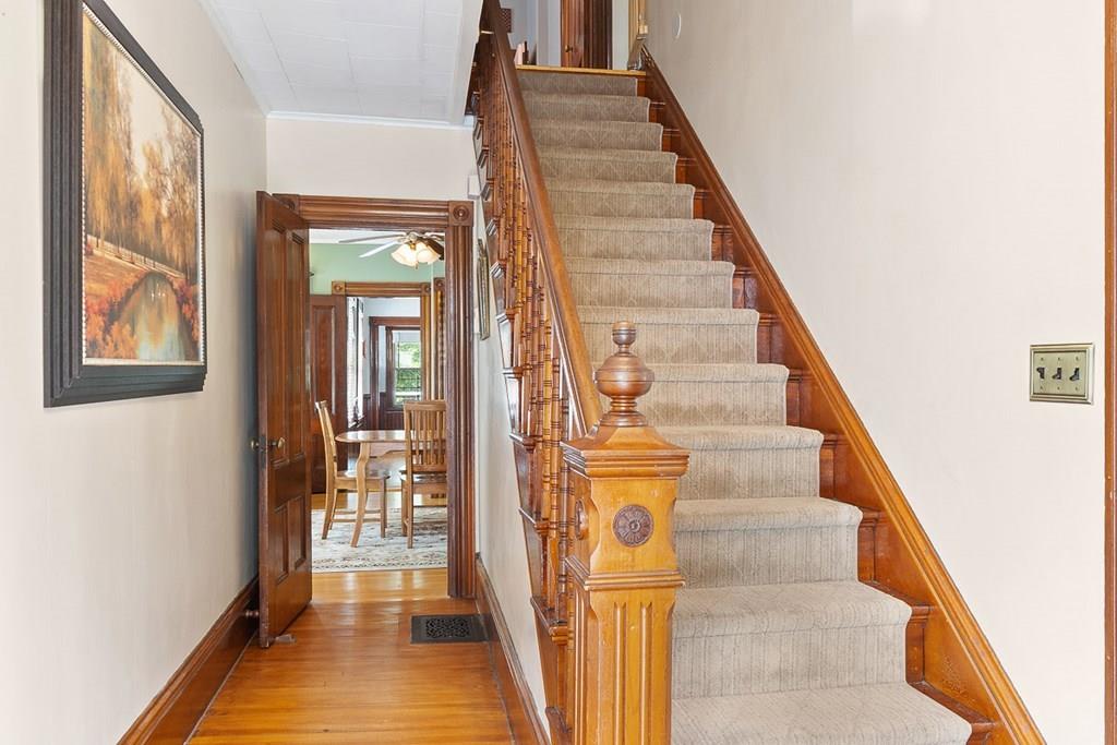 66 Manning Street Hudson, MA 01749 - Photo 16 of 40 a view of entryway and hall with wooden floor