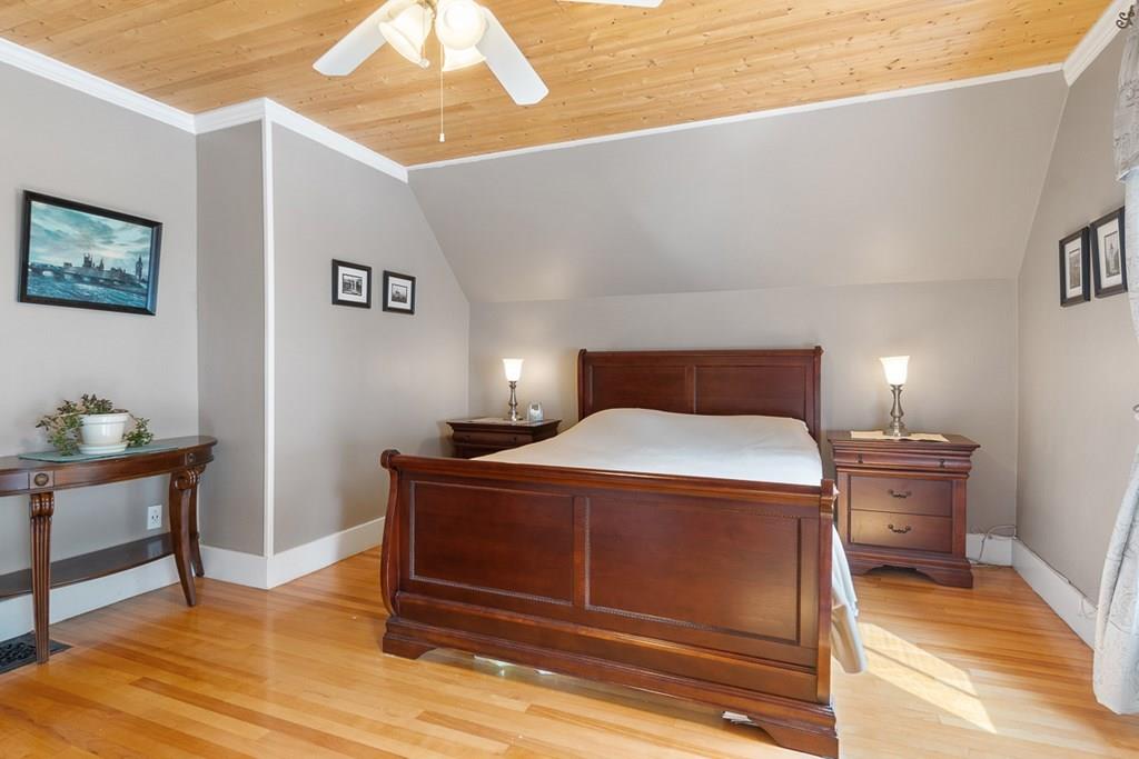 66 Manning Street Hudson, MA 01749 - Photo 20 of 40 a bedroom with a bed and a table