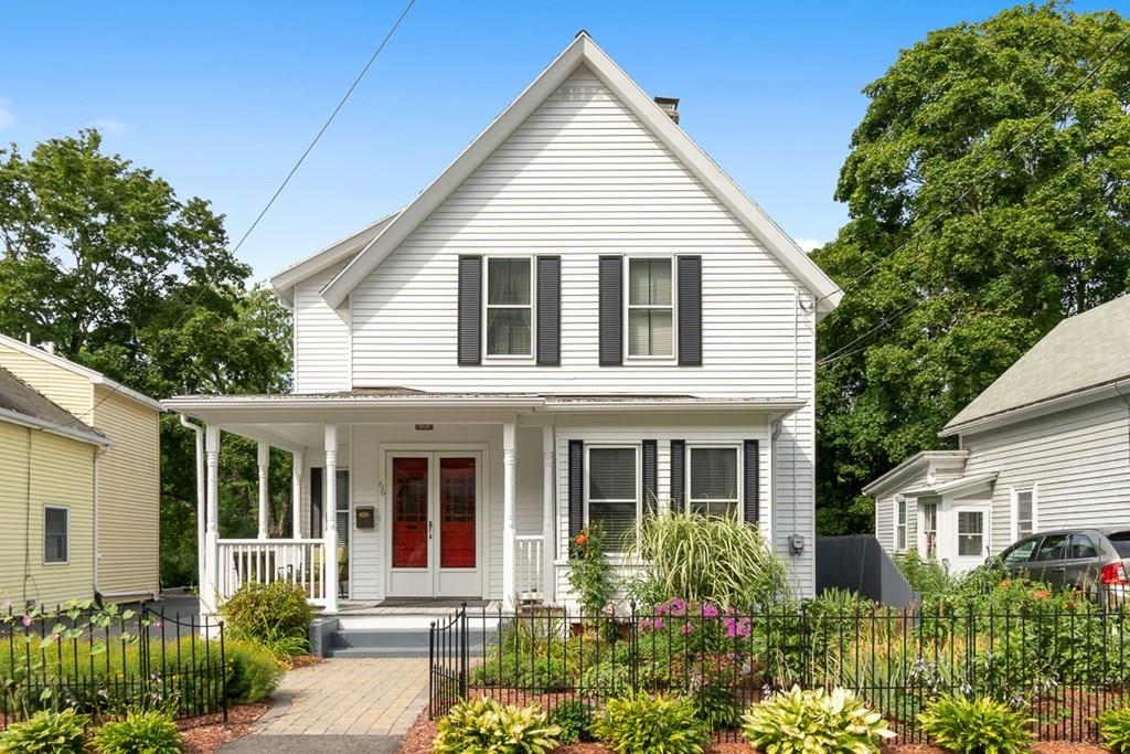 66 Manning Street Hudson, MA 01749 - Photo 2 of 40 front view of a house next to a yard