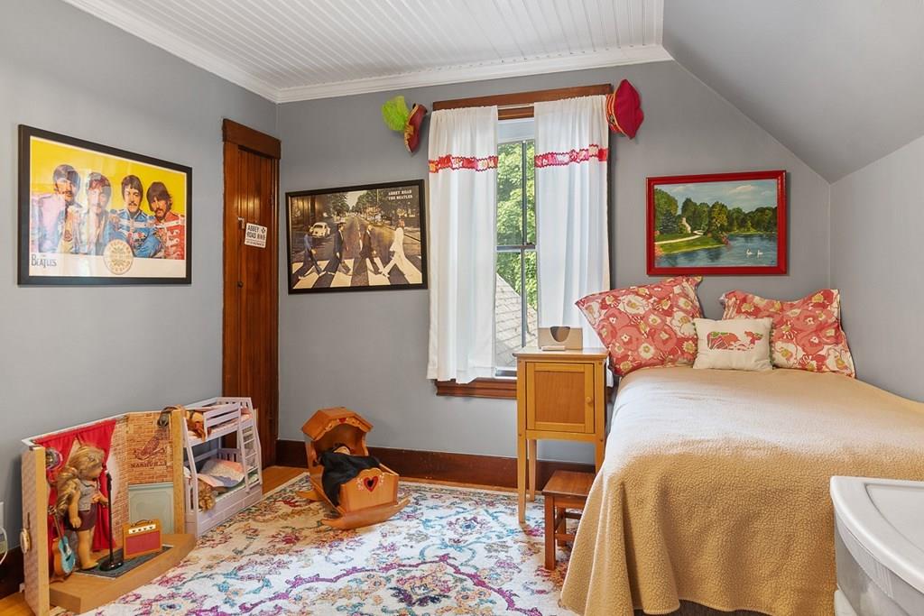 66 Manning Street Hudson, MA 01749 - Photo 22 of 40 a bedroom with furniture and a window