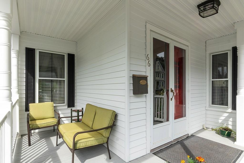 66 Manning Street Hudson, MA 01749 - Photo 28 of 40 a view of a house with a chairs in a patio